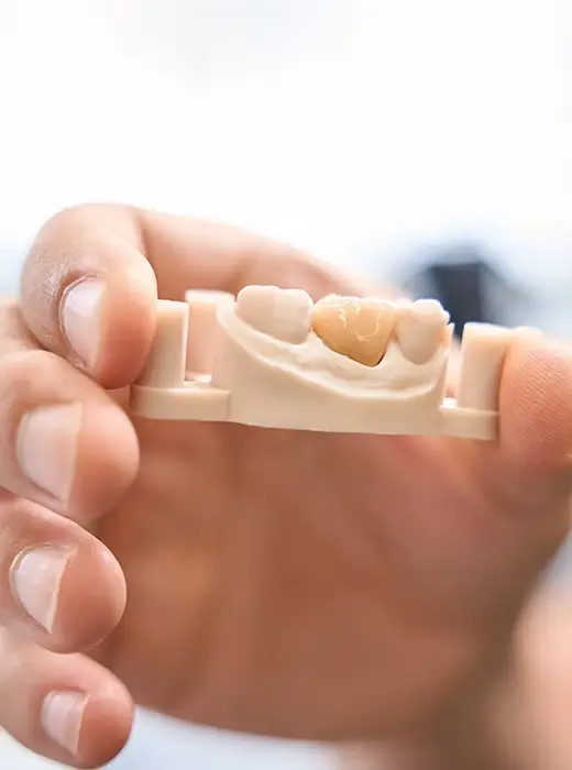 Smiling man after same-day crown treatment
