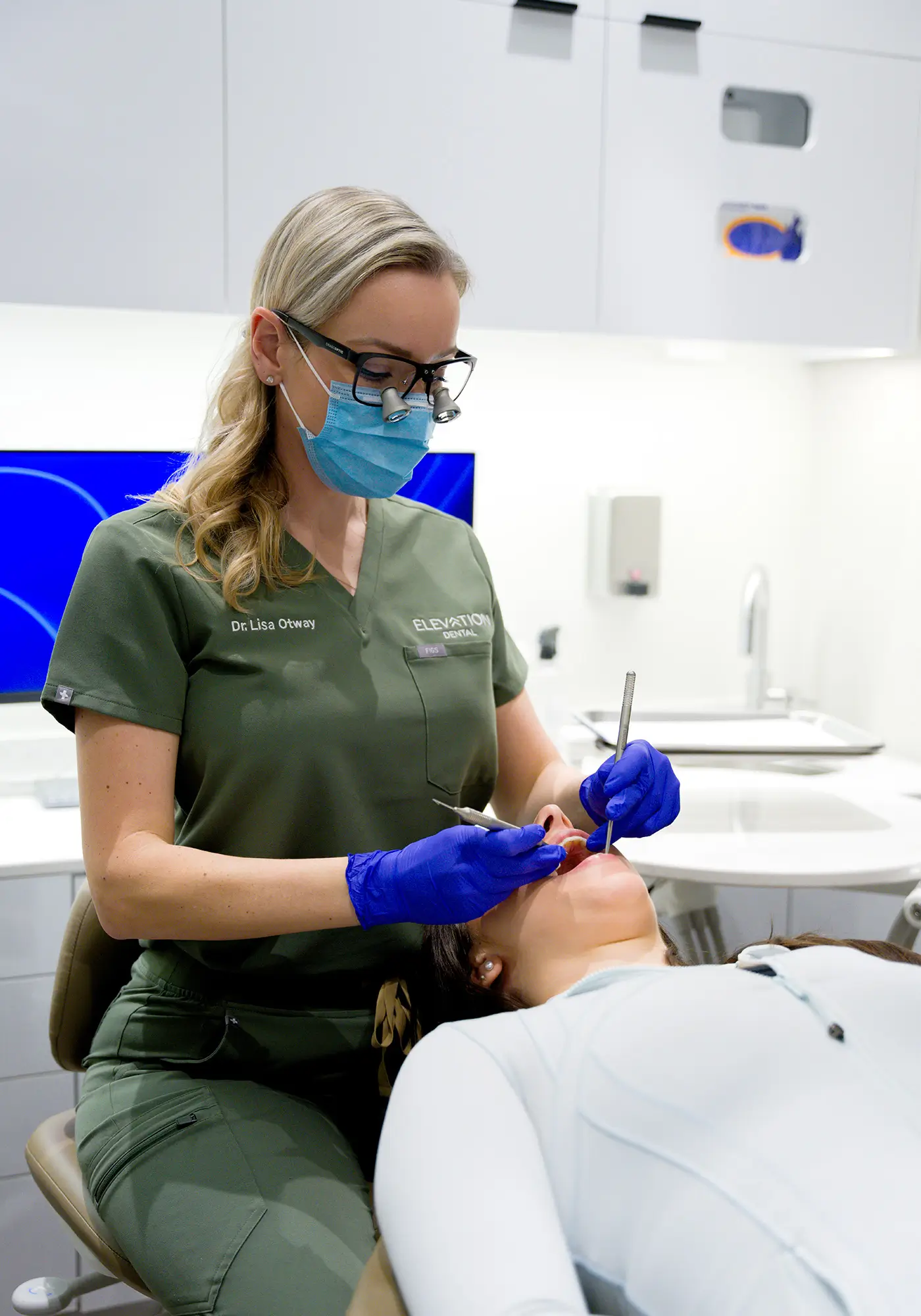 smiling woman in dentist